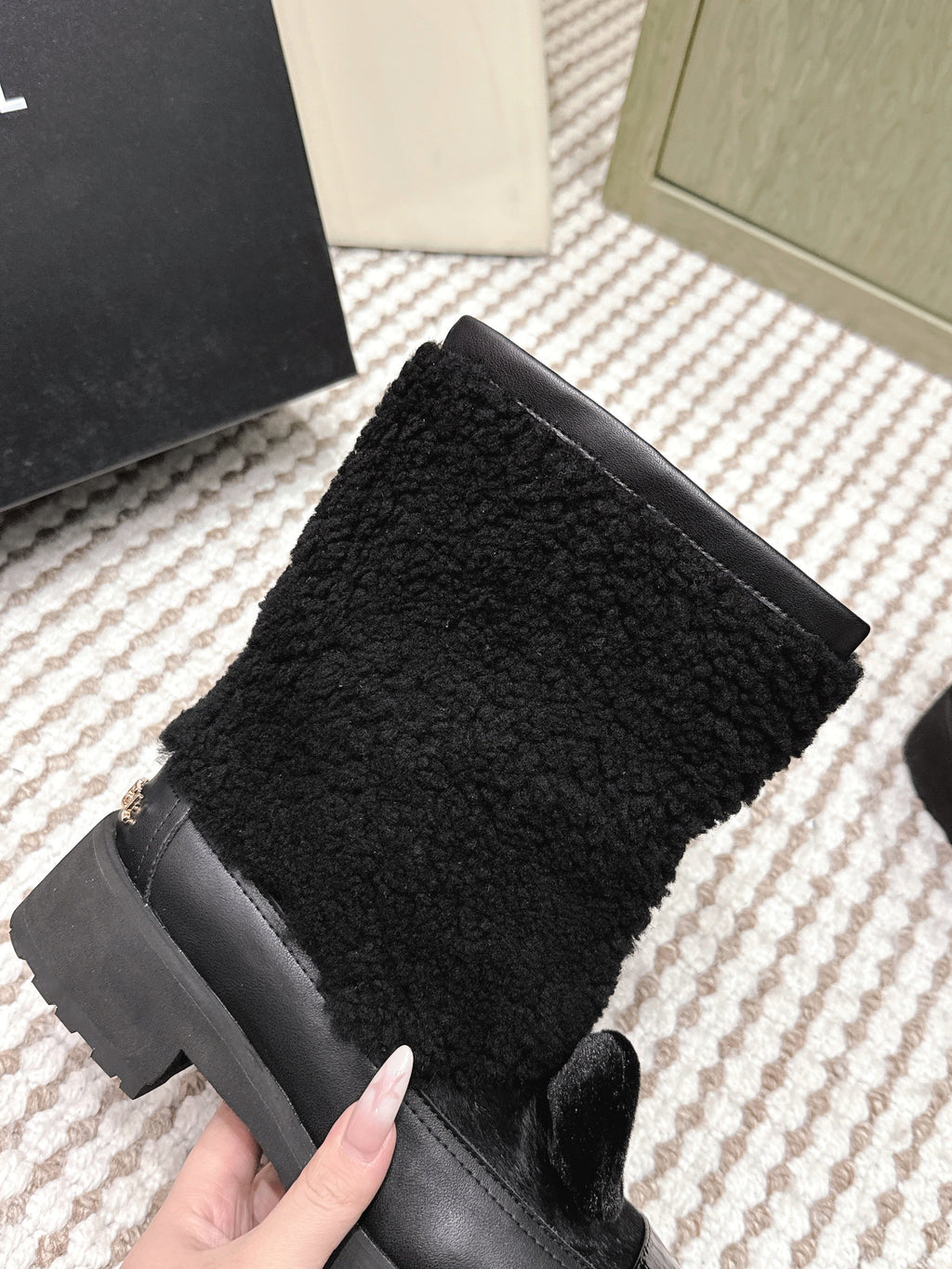 CHANEL 25S ANKLE BOOTS IN BLACK SHEARLING LAMBSKIN AND PATENT CALFSKIN